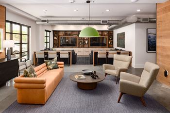 Clubhouse with a dry bar, movie lounge & innovation hubs